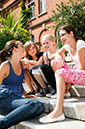 %_tempFileNameteignmouth-campus-four-girls-sitting-on-stairs-3%