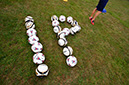 %_tempFileNameip-sign-made-of-footballs-2%
