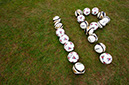 %_tempFileNameip-sign-made-of-footballs-3%